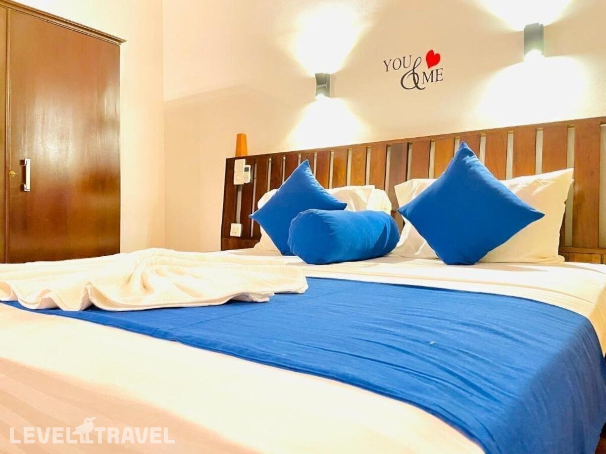 фотографии номера Делюкс с видом на море с балконом отеля Cozy Sea View Inn в Шри-Ланка(Хиккадува) - фото №1