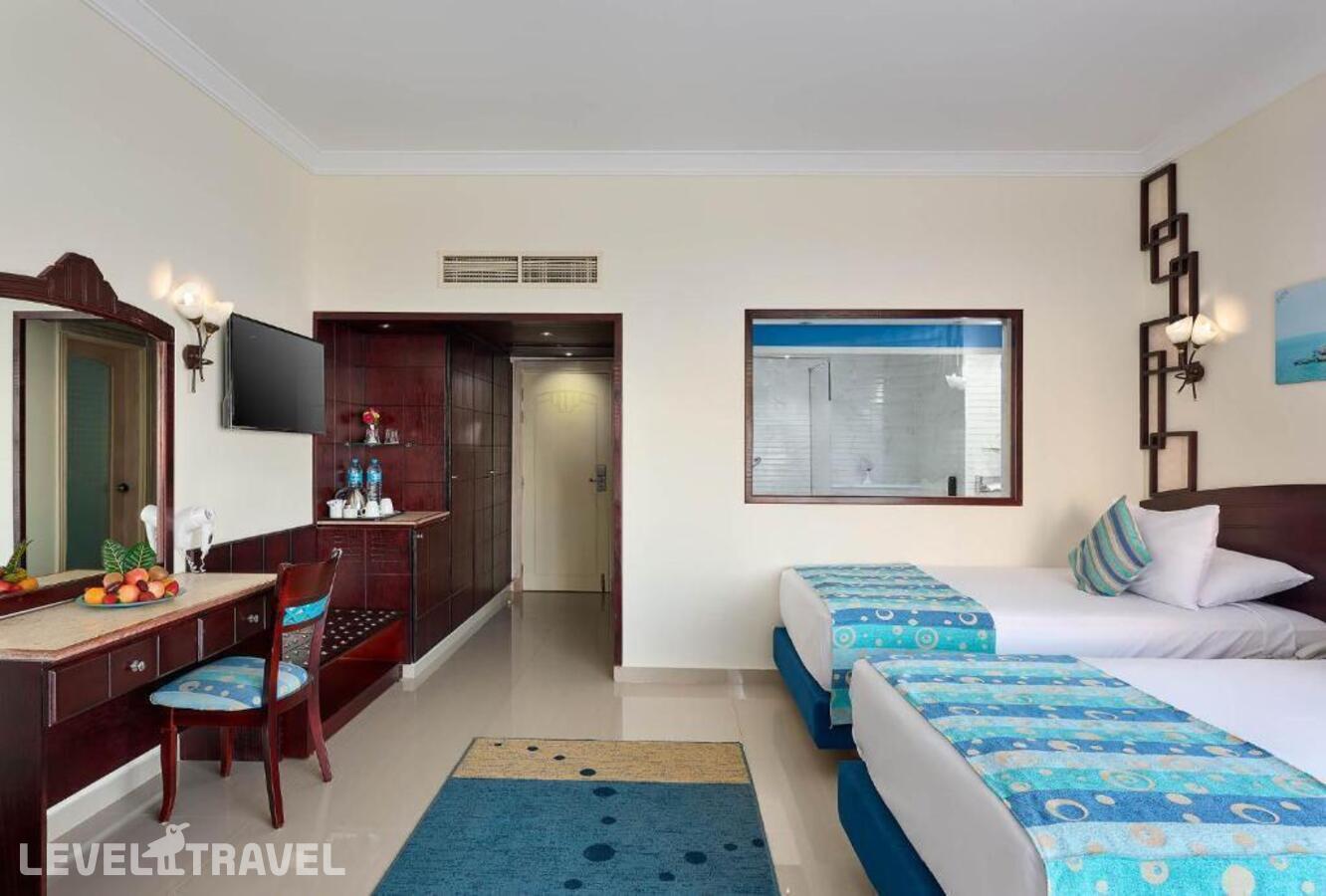 фотографии номера Улучшенный с боковым видом на море отеля Dreams Beach Resort в Египет(Тауэр Бэй) - фото №1