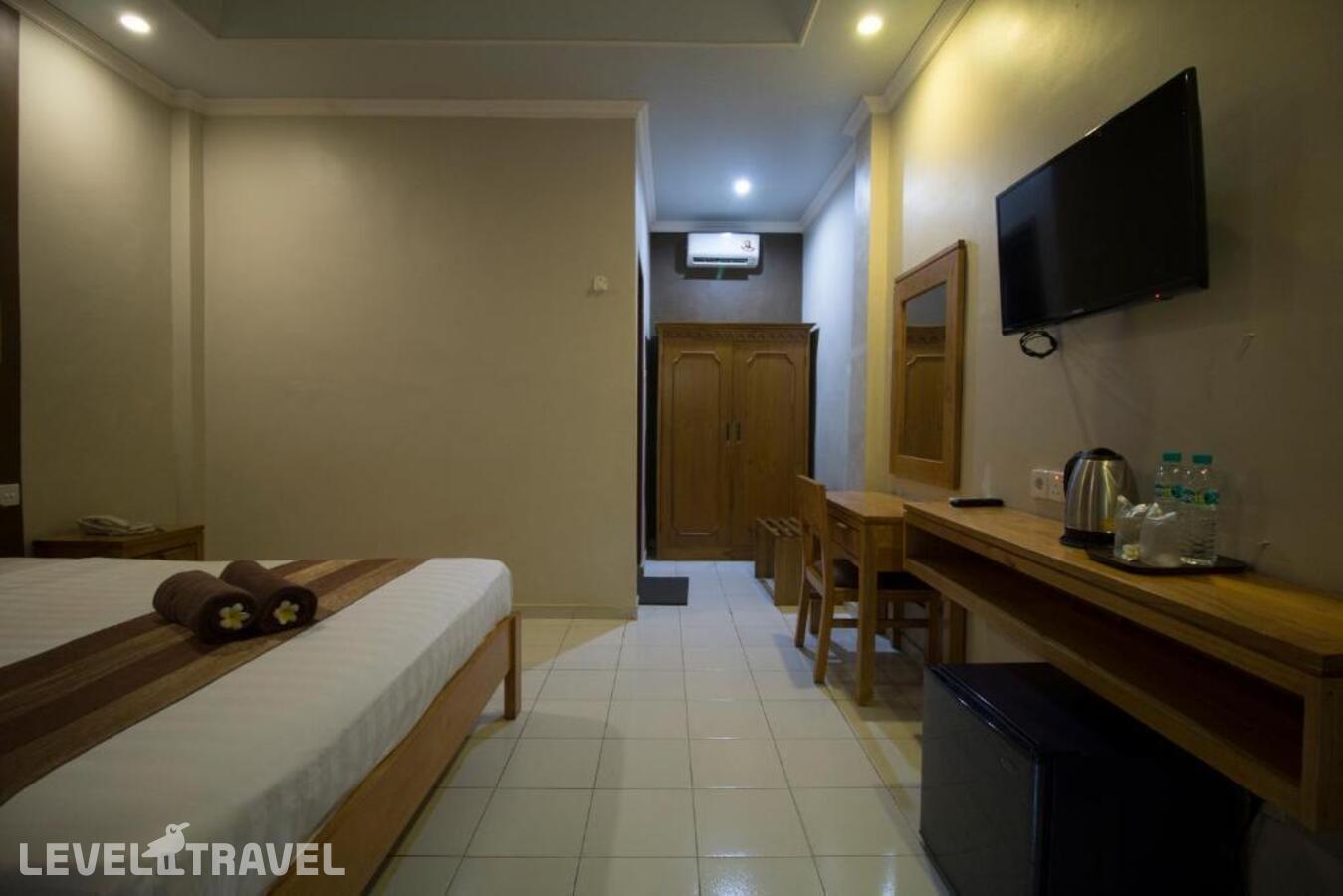 фотографии номера Делюкс отеля Bakung Sari Resort And Spa в Индонезия(Кута) - фото №2