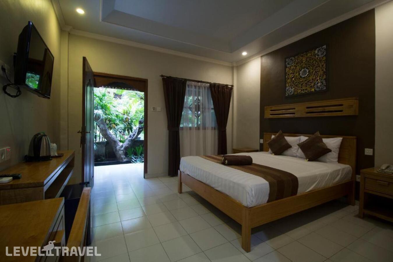 фотографии номера Делюкс отеля Bakung Sari Resort And Spa в Индонезия(Кута) - фото №1