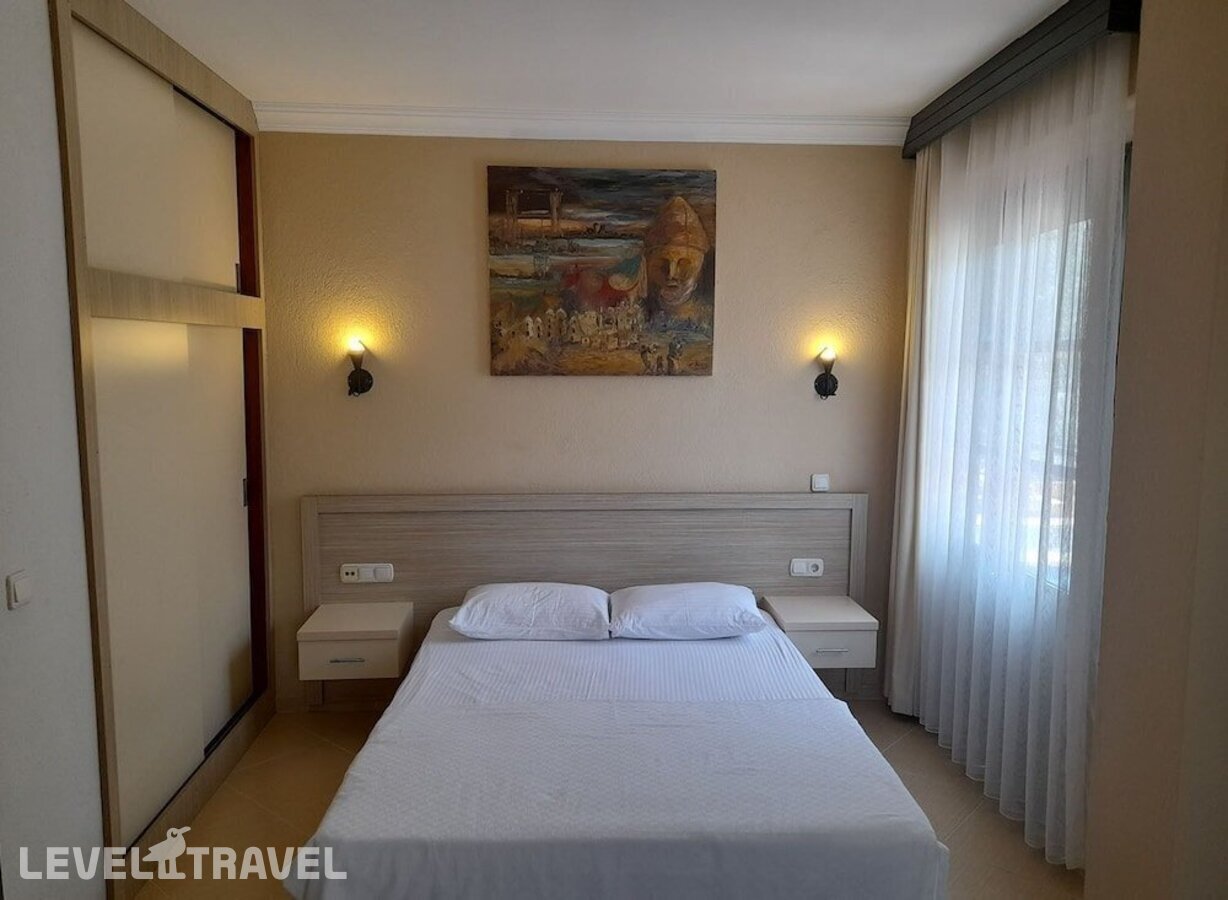 фотографии номера Стандартный с видом на море отеля Bellevue Hotel Fethiye в Турция(Олюдениз) - фото №6
