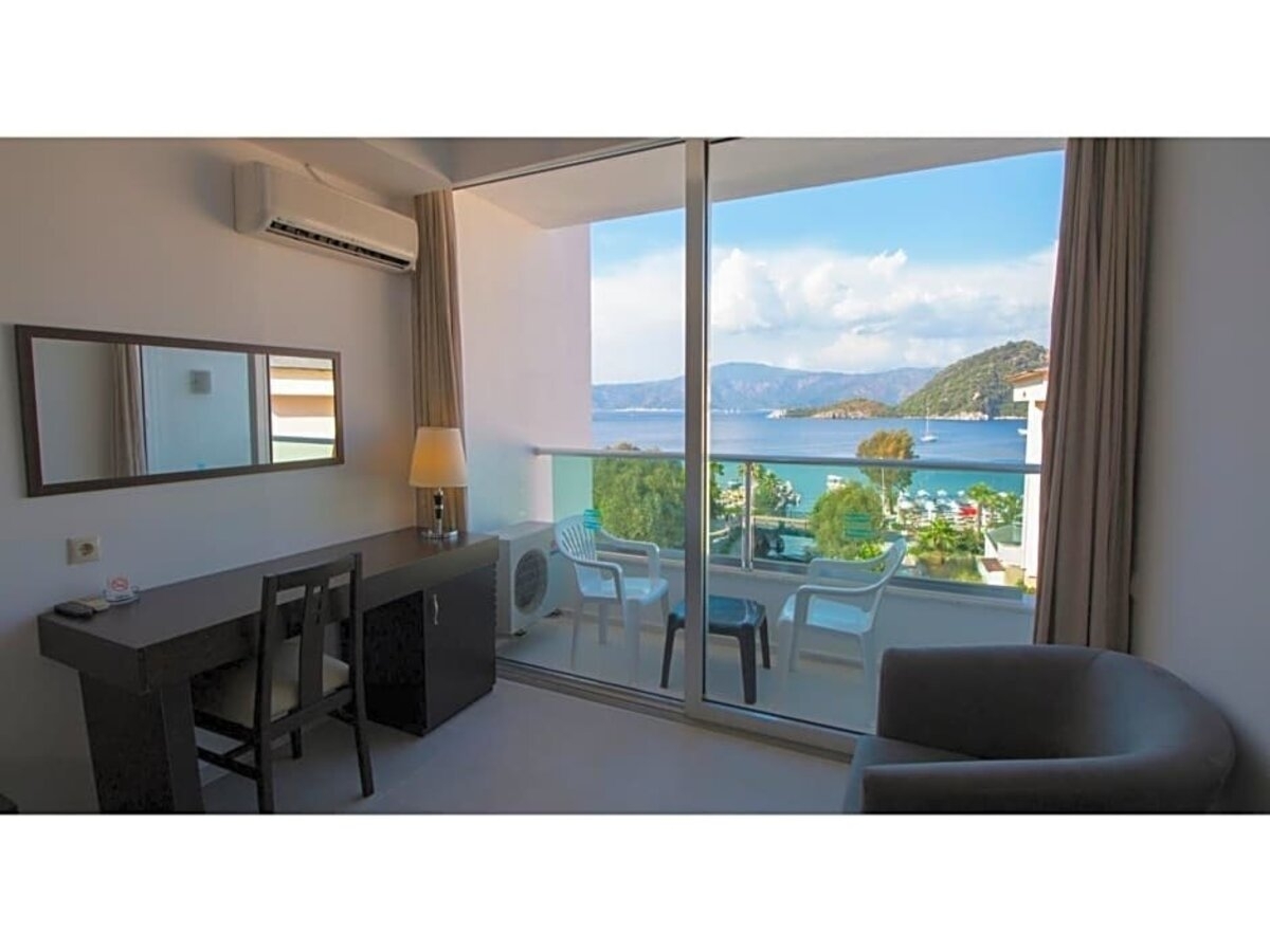 фотографии номера Стандартный с частичным видом на море отеля Supreme Beach Hotel (Adults Only 13+) (Ex.Munamar Beach Residence) в Турция(Ичмелер) - фото №6