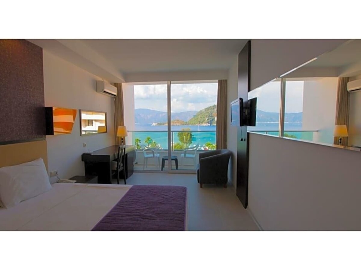 фотографии номера Стандартный с частичным видом на море отеля Supreme Beach Hotel (Adults Only 13+) (Ex.Munamar Beach Residence) в Турция(Ичмелер) - фото №5