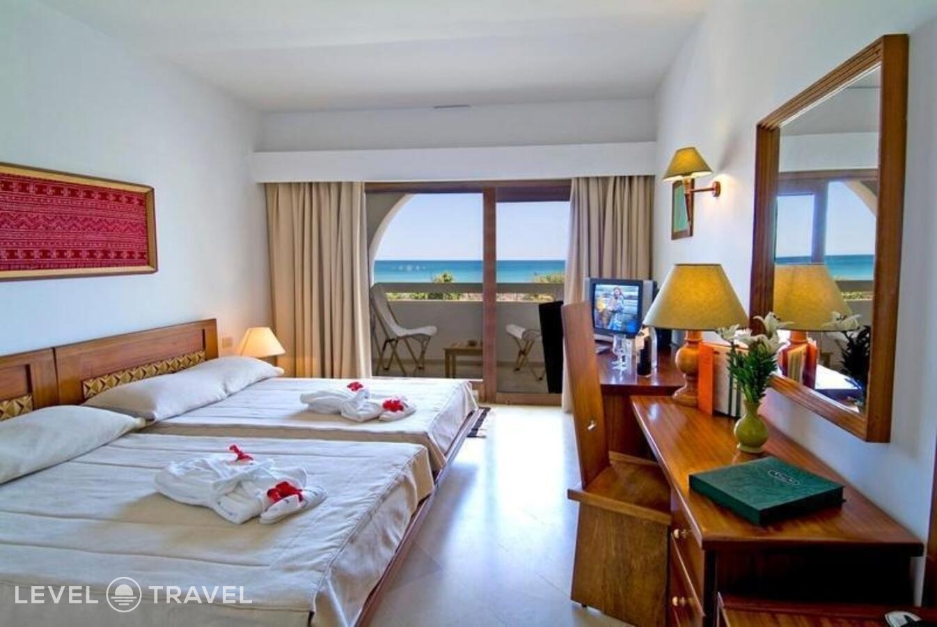 фотографии номера Трехместный номер отеля Les Orangers Beach Resort & Bungalows в Тунис(Хаммамет) - фото №2