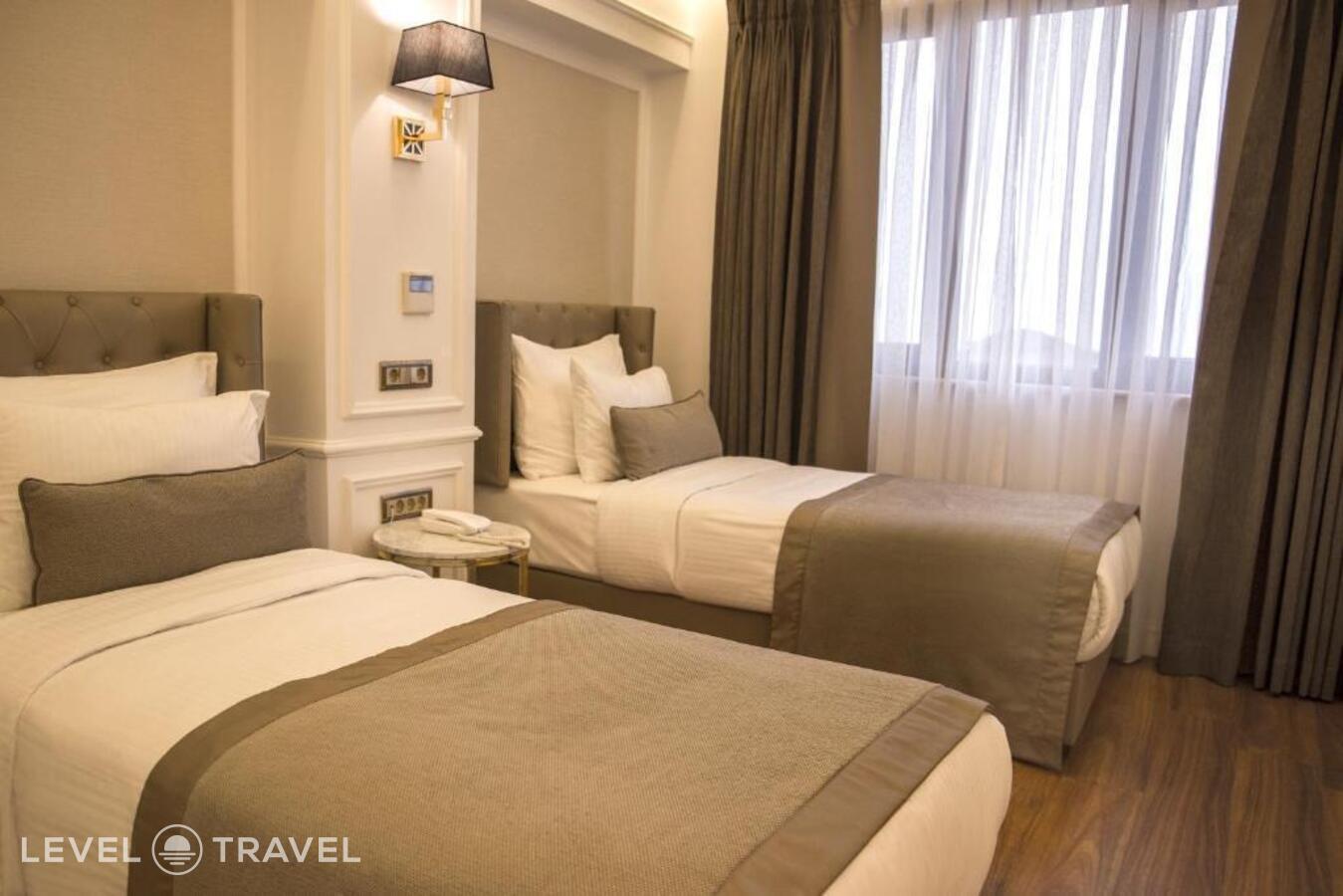 фотографии номера Улучшенный с видом на море отеля Mina Hotel в Турция(Фатих) - фото №2