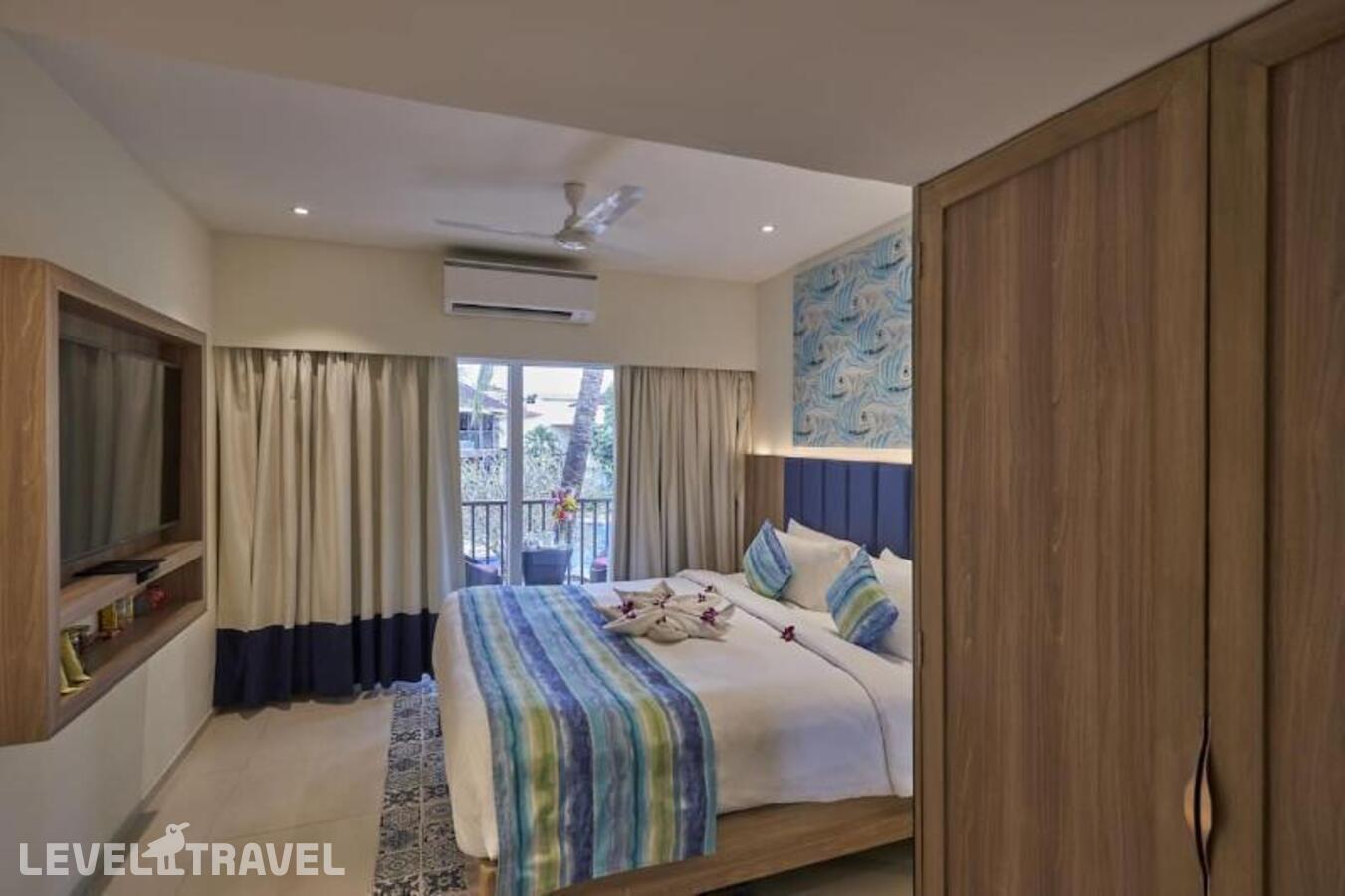 фотографии номера Роскошный люкс (двуспальная кровать) отеля Royal Orchid Beach Resort в Индия(Уторда) - фото №46
