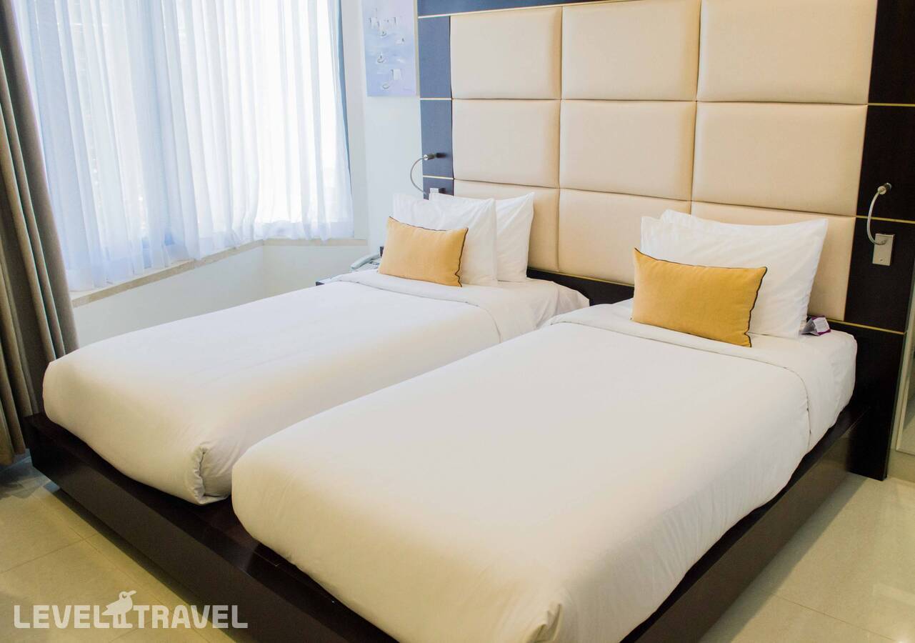 фотографии номера Делюкс отеля Holiday Beach Hotel Danang в Вьетнам(Дананг) - фото №2