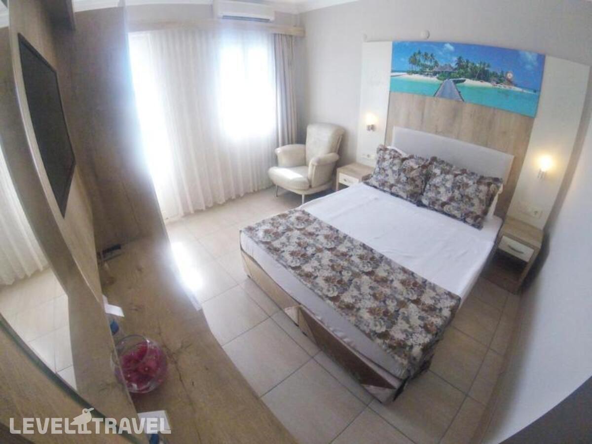 фотографии номера Делюкс с видом на море отеля Akkan Beach Hotel в Турция(Бодрум - центр) - фото №1