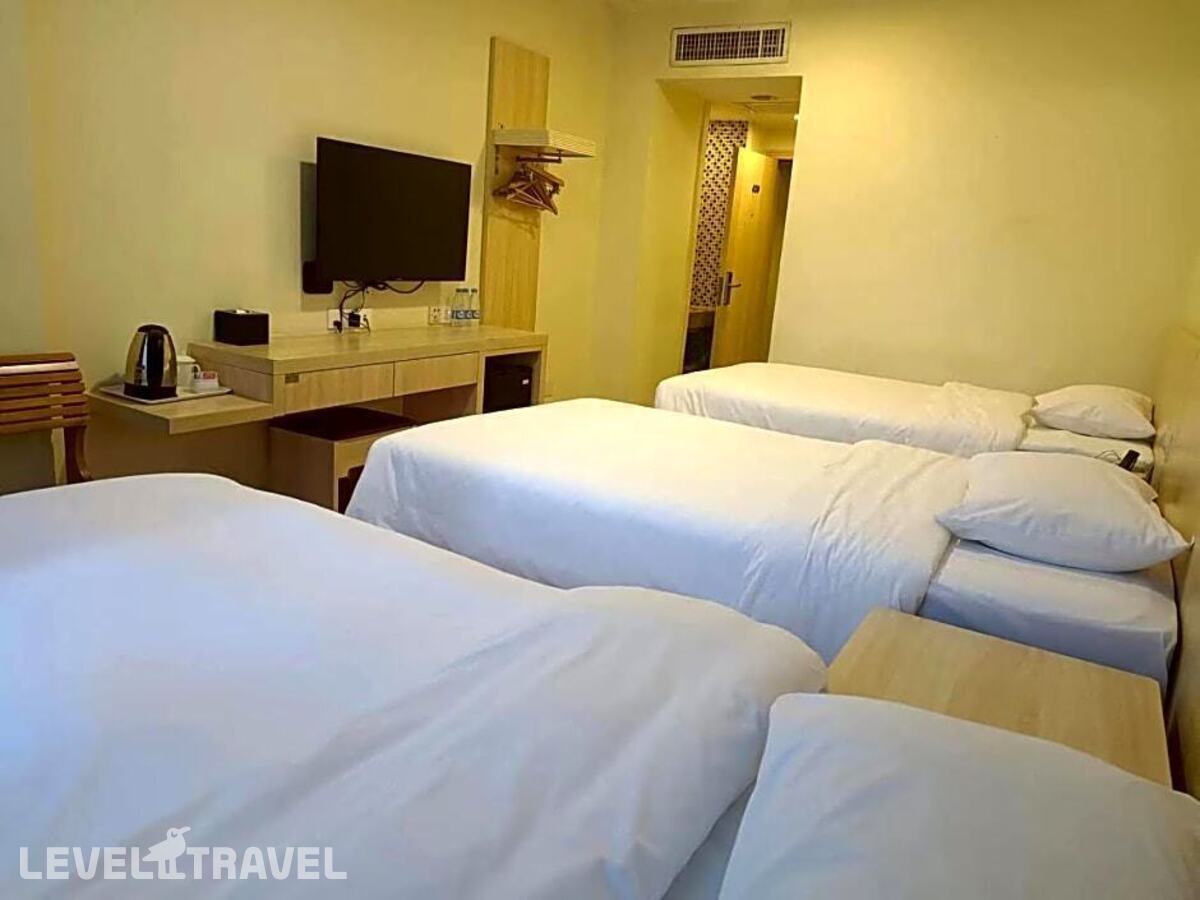 фотографии номера Трехместный номер отеля Baiyun City Hotel в Китай(Гуанчжоу) - фото №4