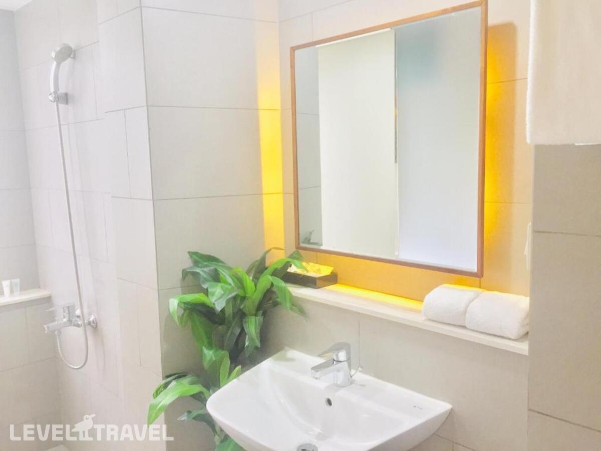 фотографии номера Делюкс с видом на город отеля Liberty Hotel Saigon Greenview в Вьетнам(Хошимин (Сайгон)) - фото №3