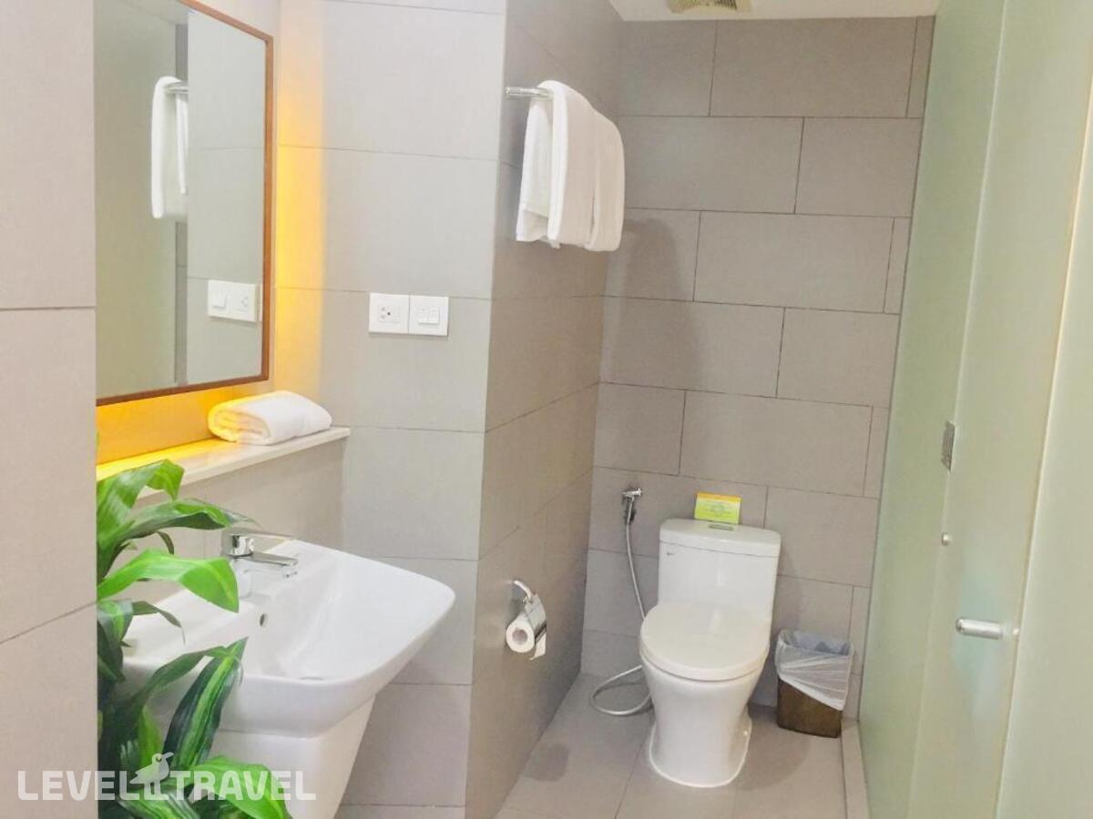 фотографии номера Делюкс с видом на город отеля Liberty Hotel Saigon Greenview в Вьетнам(Хошимин (Сайгон)) - фото №2