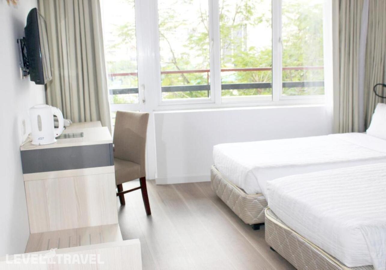 фотографии номера Делюкс с видом на город отеля Liberty Hotel Saigon Greenview в Вьетнам(Хошимин (Сайгон)) - фото №7