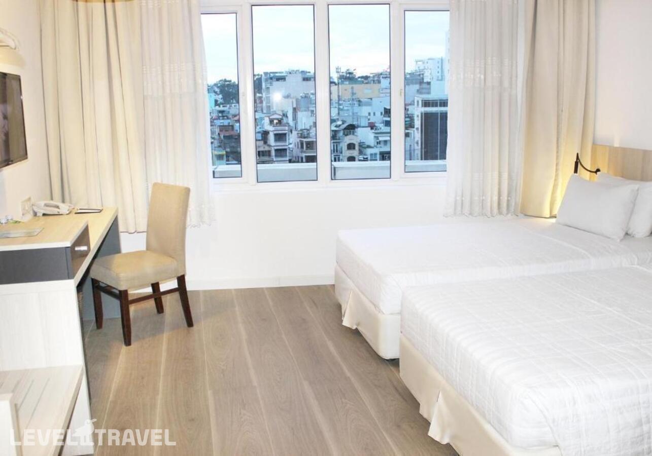 фотографии номера Делюкс с видом на город отеля Liberty Hotel Saigon Greenview в Вьетнам(Хошимин (Сайгон)) - фото №6