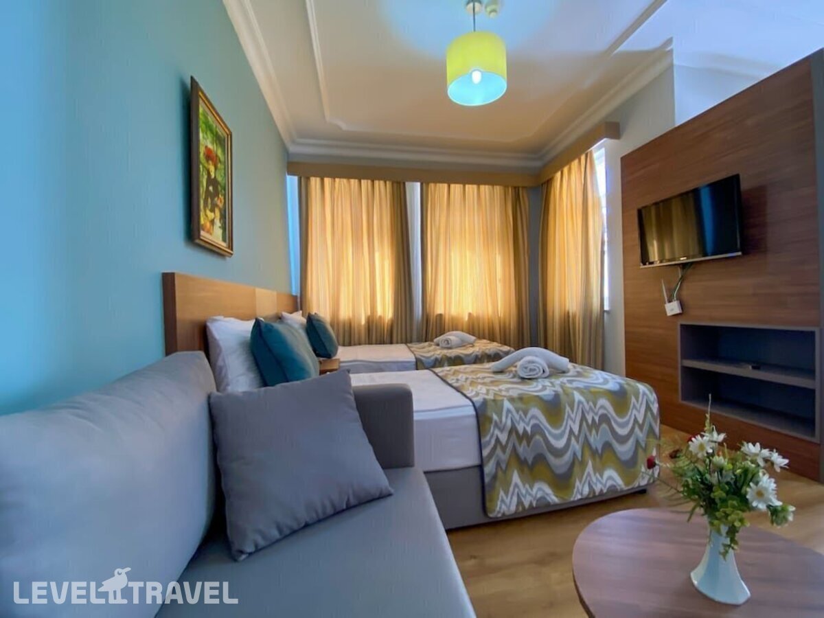 фотографии номера Семейный с балконом отеля Side Village Hotel в Турция(Кумкёй) - фото №2
