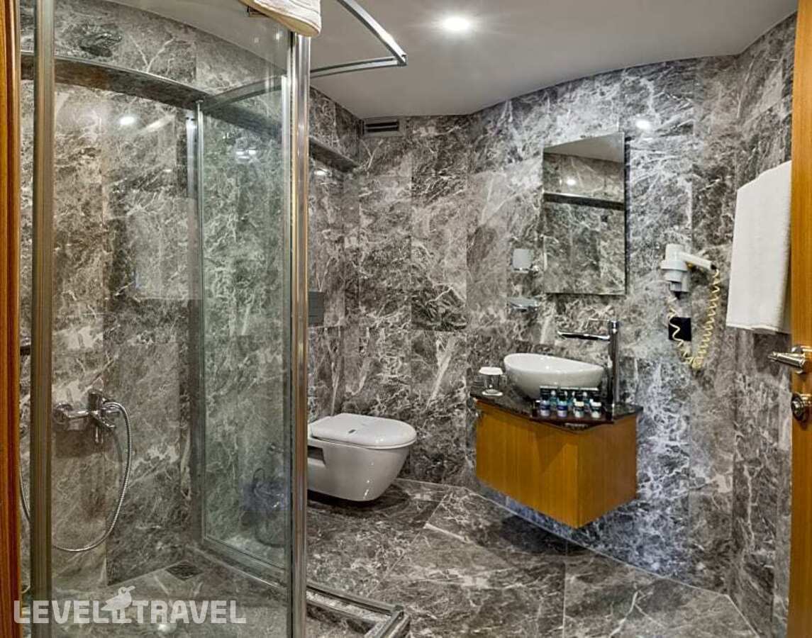 фотографии номера Стандартный с видом на город отеля Bergama Hotel в Турция(Фатих) - фото №1