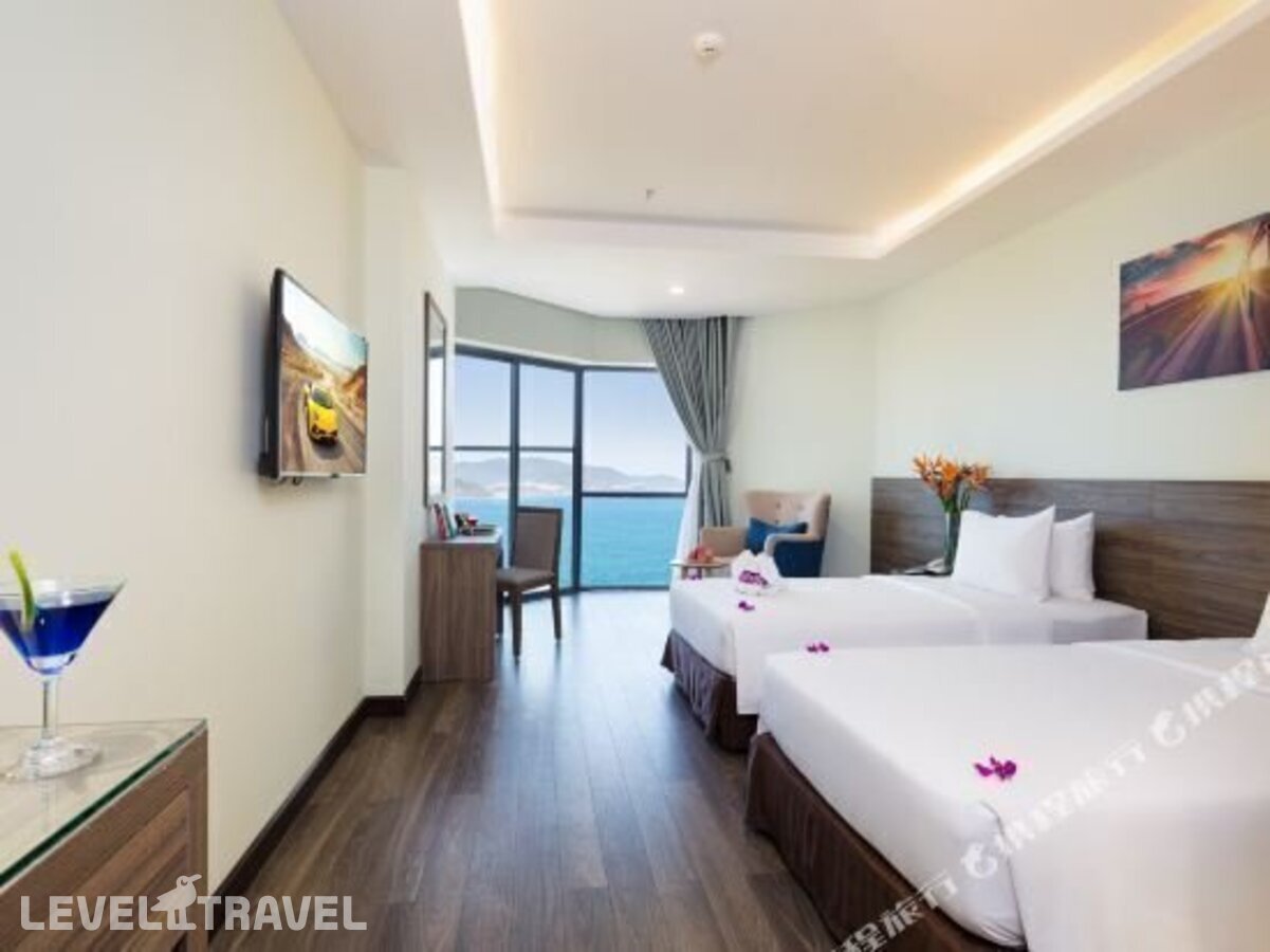 фотографии номера Делюкс с видом на море отеля Xavia Hotel в Вьетнам(Нячанг) - фото №5