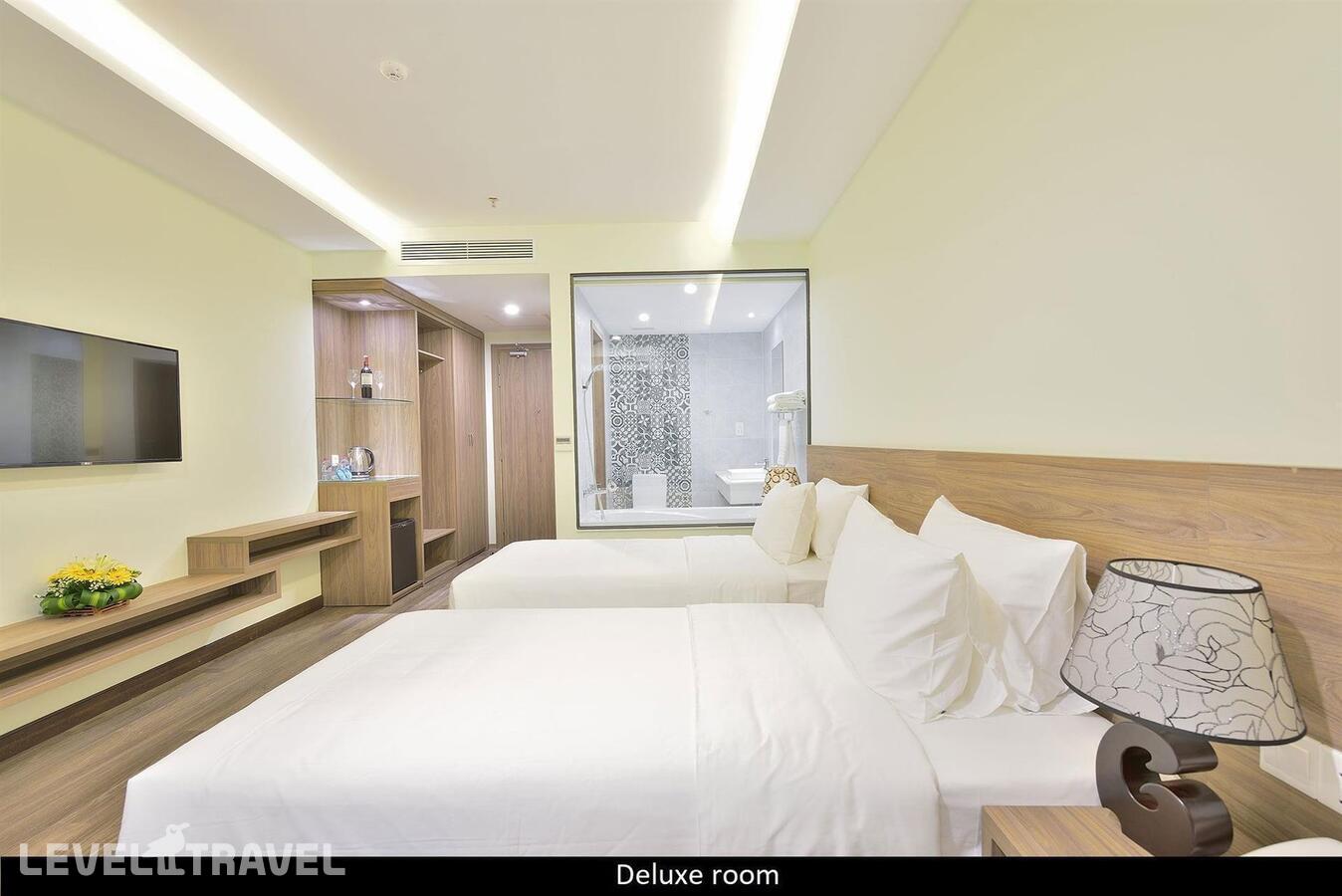 фотографии номера Делюкс с видом на море отеля Xavia Hotel в Вьетнам(Нячанг) - фото №3