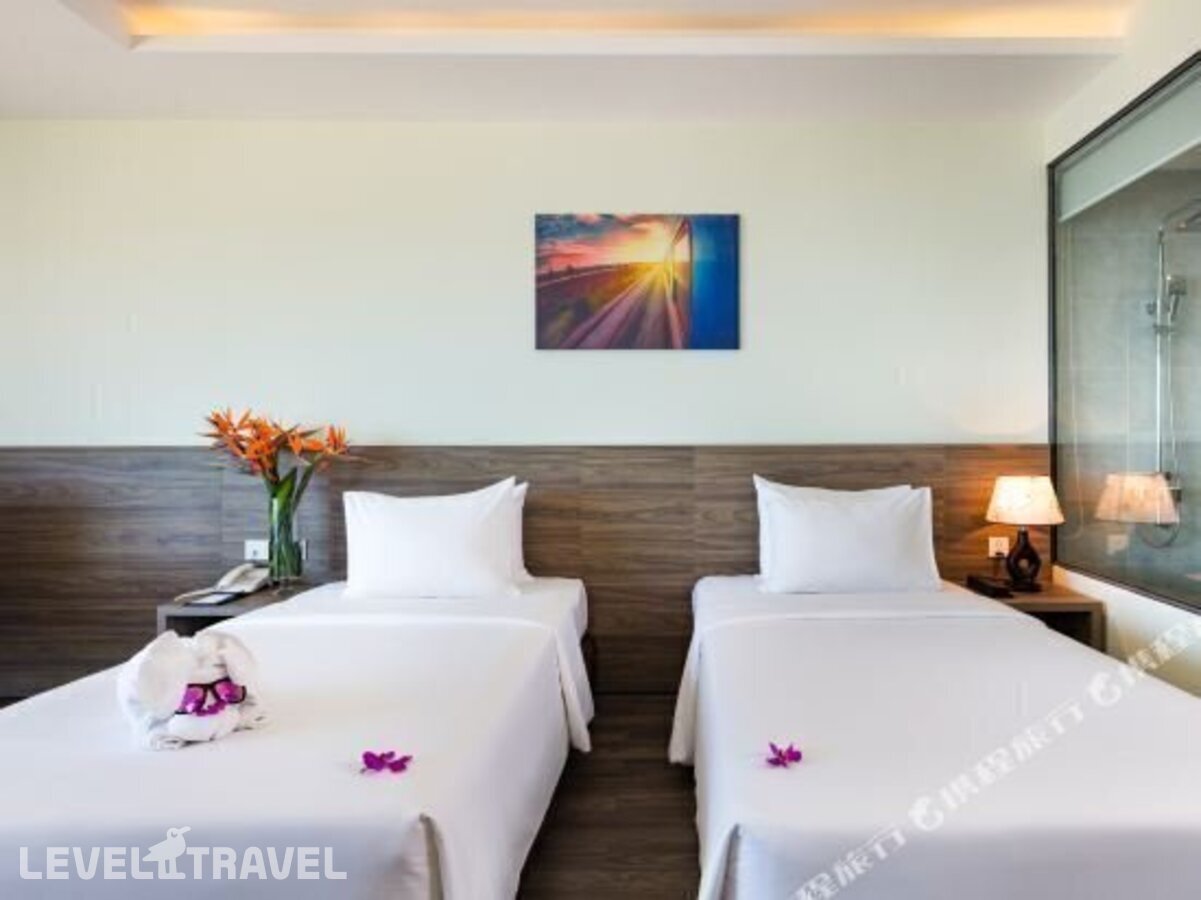 фотографии номера Делюкс с видом на море отеля Xavia Hotel в Вьетнам(Нячанг) - фото №6