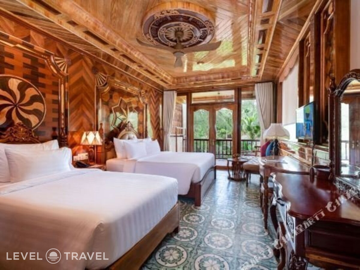 фотографии номера Делюкс с частичным видом на море отеля Coco Palm Beach Resort & Spa в Вьетнам(Фукуок) - фото №3