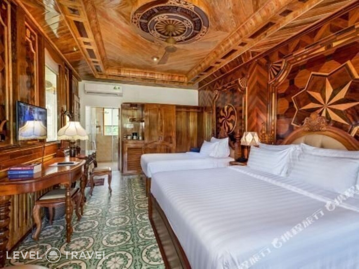 фотографии номера Делюкс с частичным видом на море отеля Coco Palm Beach Resort & Spa в Вьетнам(Фукуок) - фото №2