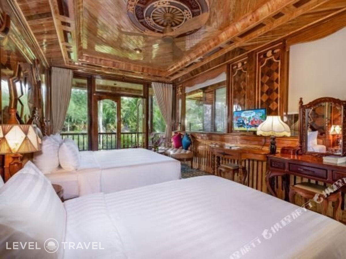 фотографии номера Делюкс с частичным видом на море отеля Coco Palm Beach Resort & Spa в Вьетнам(Фукуок) - фото №4