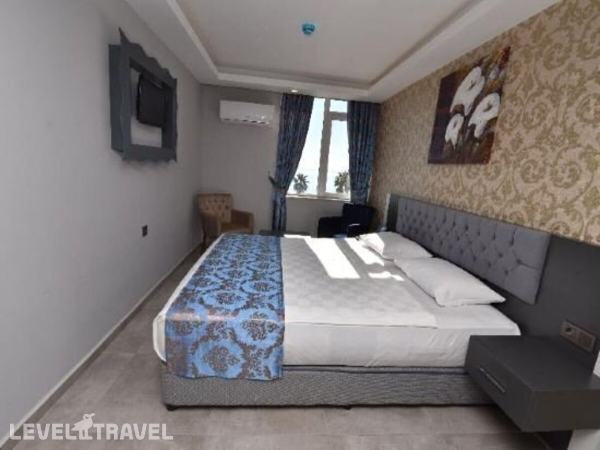 фотографии номера Стандартный с видом на окрестности отеля Erdem Hotel в Турция(Коньяалты) - фото №6