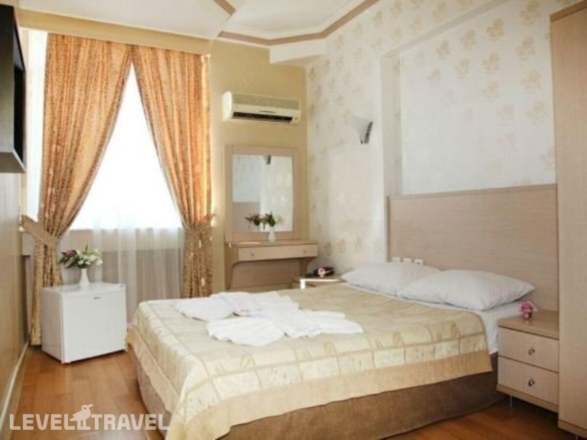 фотографии номера Стандартный с видом на окрестности отеля Erdem Hotel в Турция(Коньяалты) - фото №7