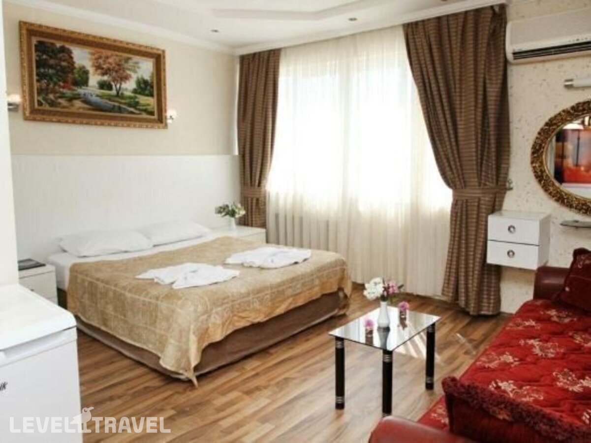 фотографии номера Стандартный с видом на окрестности отеля Erdem Hotel в Турция(Коньяалты) - фото №4