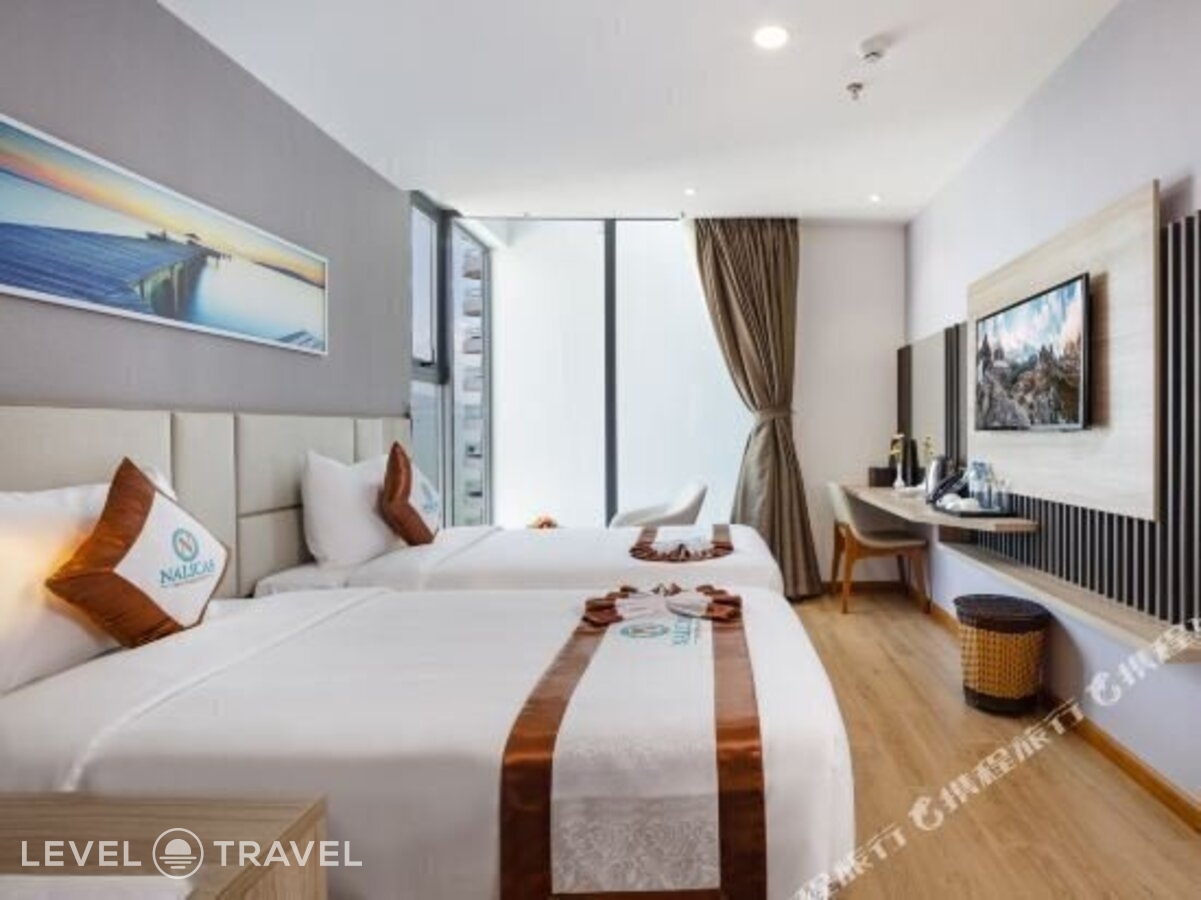 фотографии номера Делюкс с частичным видом на море отеля Nalicas Hotel в Вьетнам(Нячанг) - фото №7
