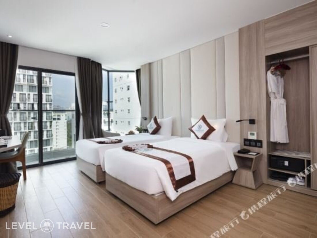 фотографии номера Делюкс с частичным видом на море отеля Nalicas Hotel в Вьетнам(Нячанг) - фото №6