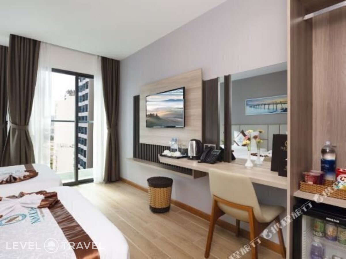 фотографии номера Делюкс с частичным видом на море отеля Nalicas Hotel в Вьетнам(Нячанг) - фото №12