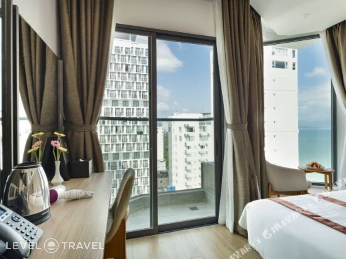 фотографии номера Делюкс с частичным видом на море отеля Nalicas Hotel в Вьетнам(Нячанг) - фото №4