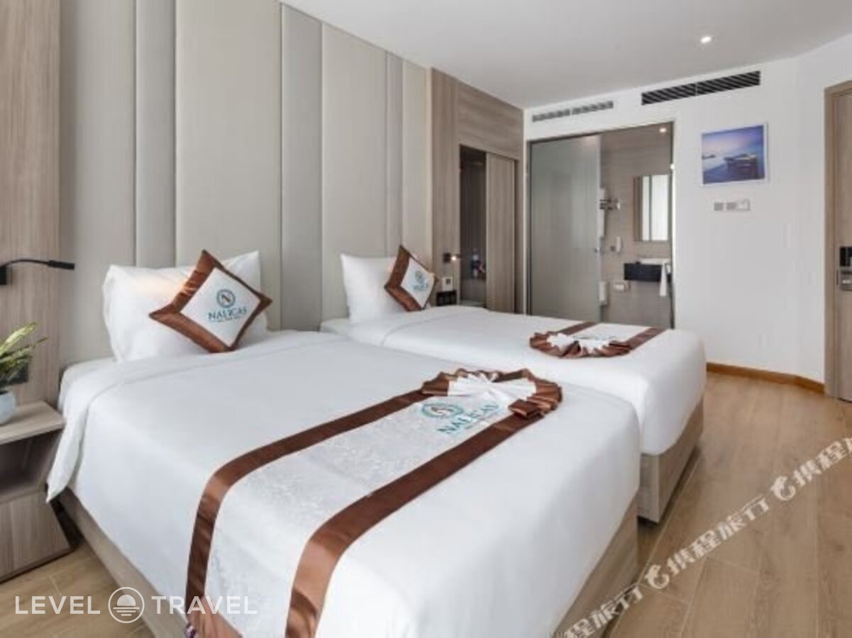 фотографии номера Делюкс с частичным видом на море отеля Nalicas Hotel в Вьетнам(Нячанг) - фото №11