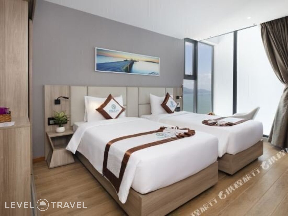 фотографии номера Делюкс с частичным видом на море отеля Nalicas Hotel в Вьетнам(Нячанг) - фото №5