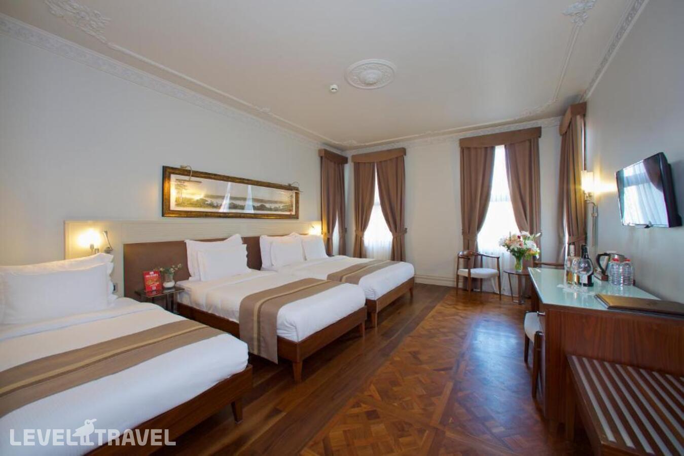 фотографии номера Четырехместный Комфорт отеля Taxim Lounge Hotel в Турция(Бейоглу) - фото №4