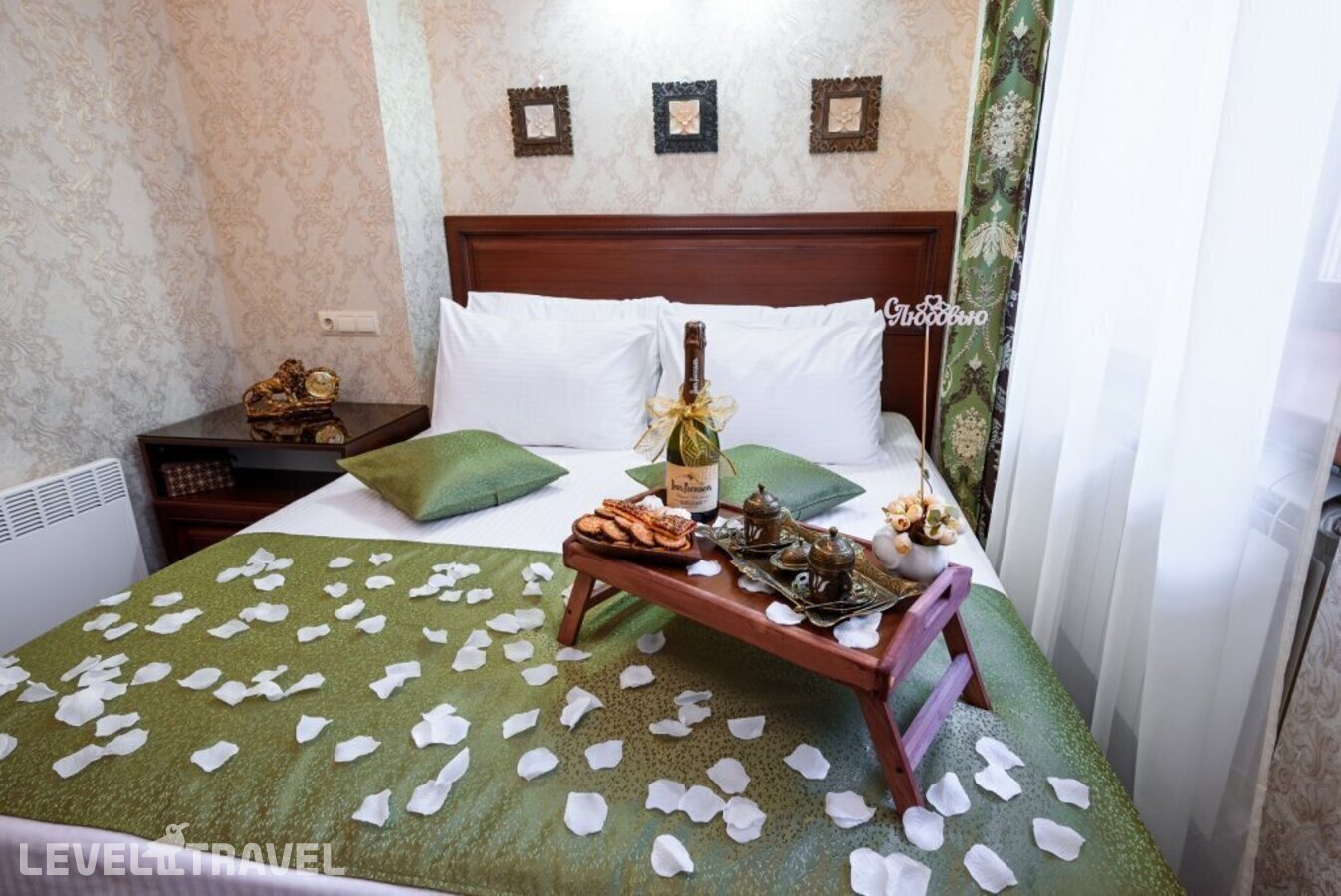 фотографии номера Стандартный номер отеля Kon Tiki Boutique Hotel в Россия(Адмиралтейский район) - фото №2