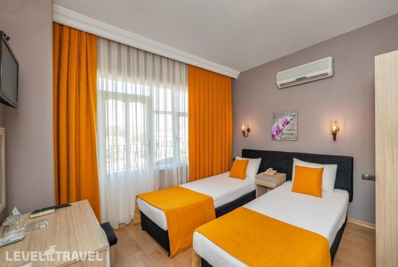 фотографии номера Стандартный с видом на море отеля Yasemin Hotel в Турция(Фетхие - центр) - фото №1