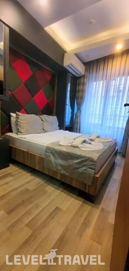 фотографии номера Четырехместный экономичный отеля Grand Esen Hotel в Турция(Сиркеджи) - фото №3