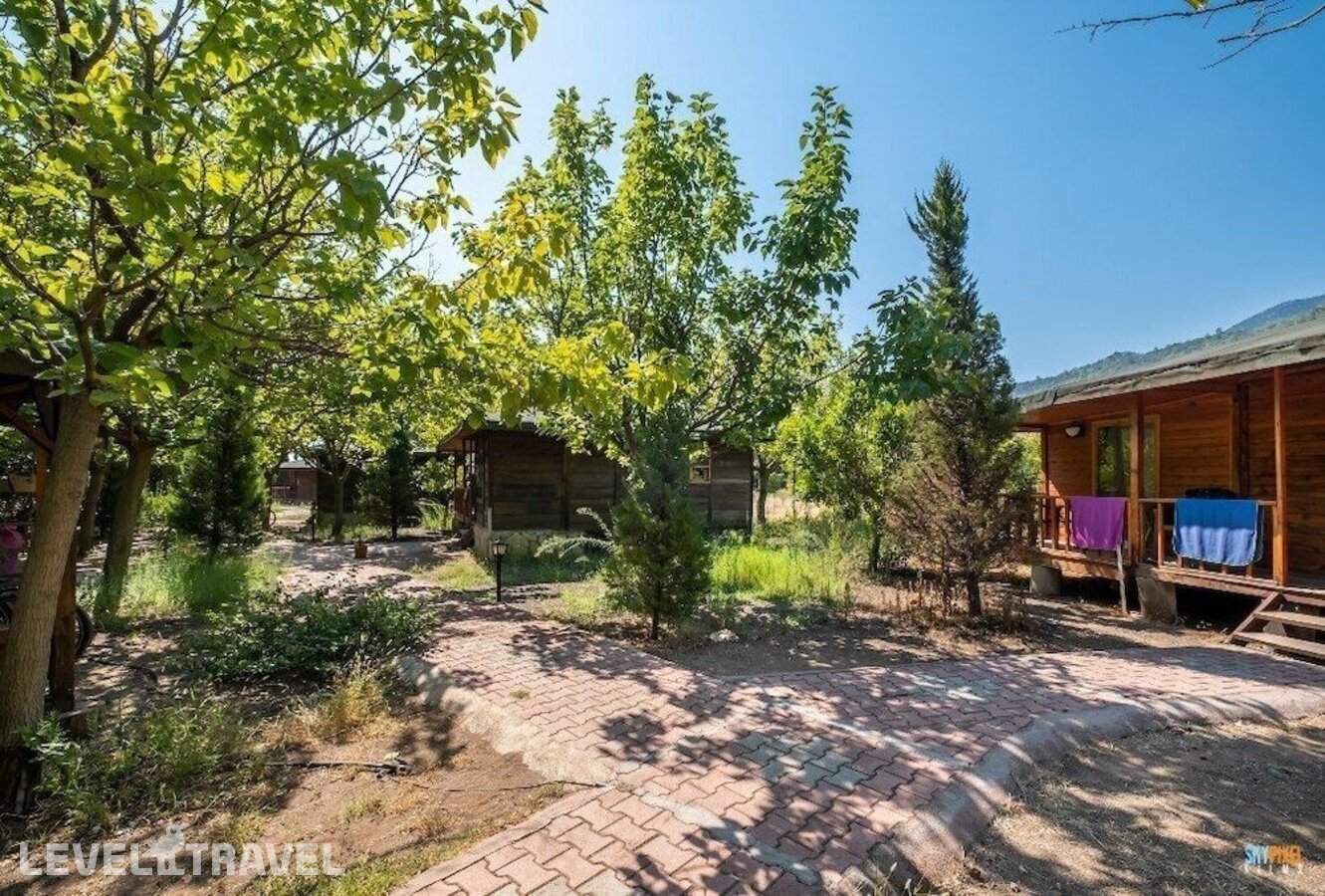 фотографии номера Стандартный с видом на сад отеля Likya Yanartas Bungalows в Турция(Чиралы) - фото №2