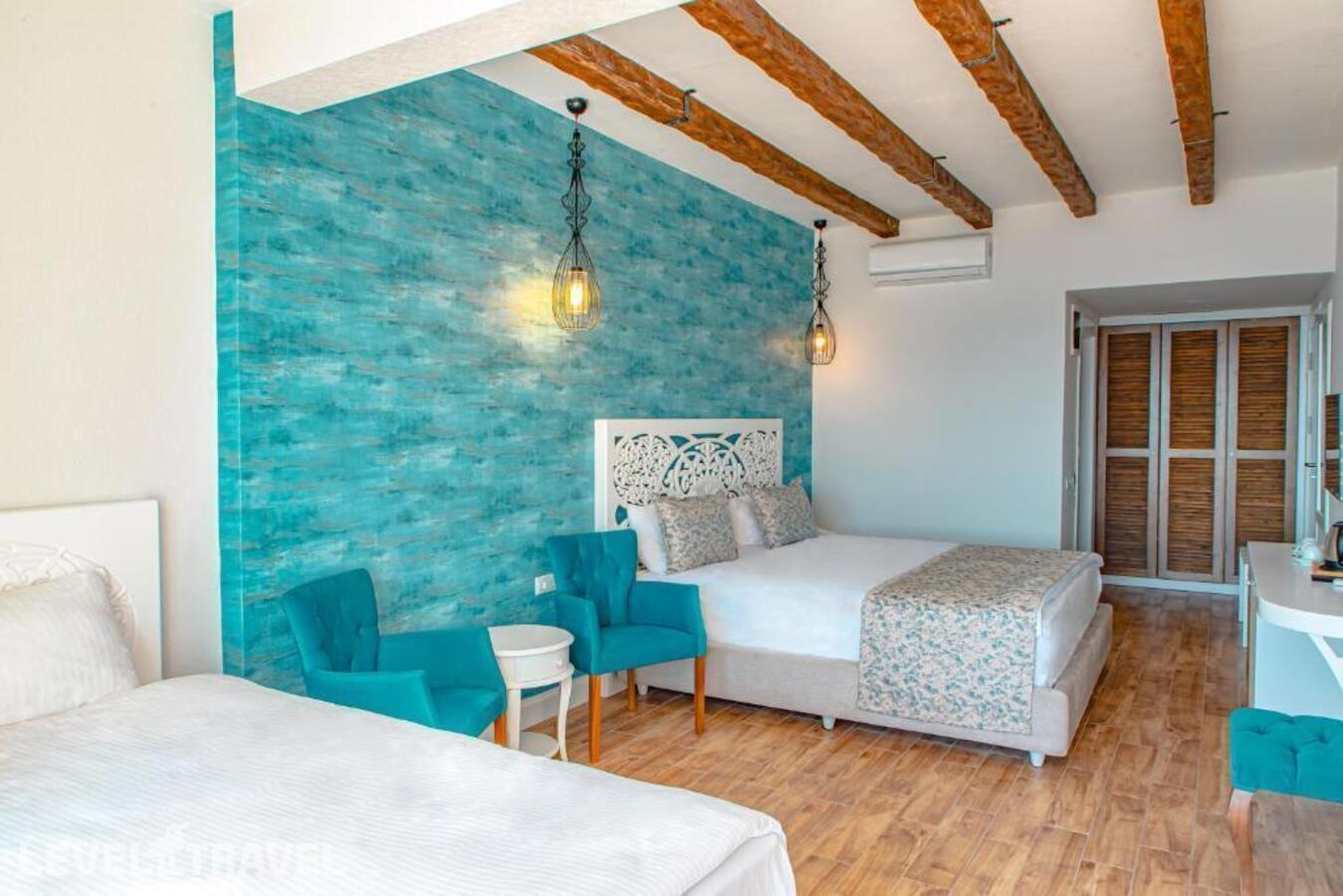 фотографии номера Трехместный с видом на море отеля Casa Mare Bodrum в Турция(Бодрум - центр) - фото №3