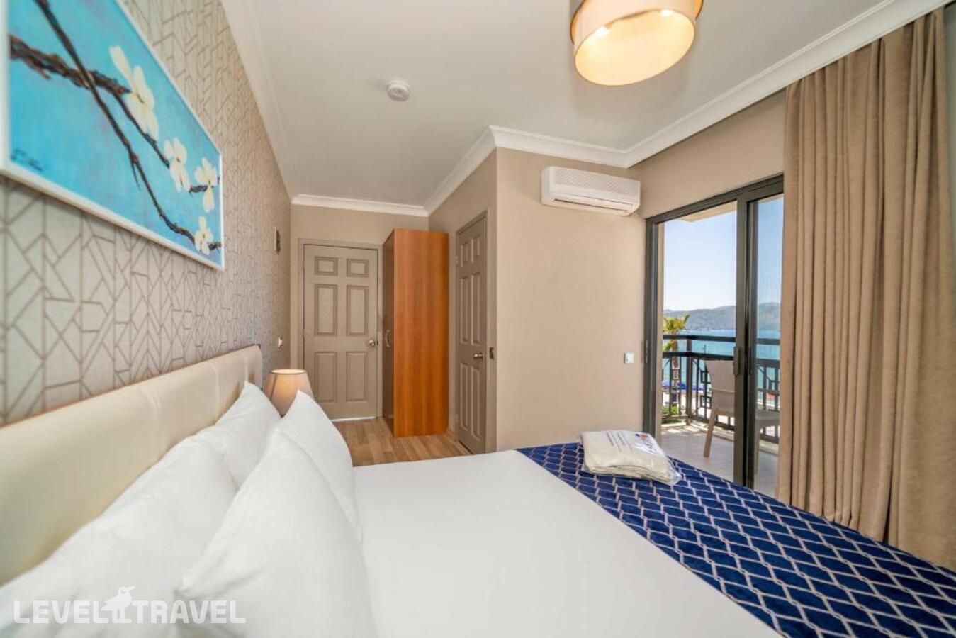 фотографии номера Стандартный с видом на море отеля Uras Beach Hotel в Турция(Фетхие) - фото №4