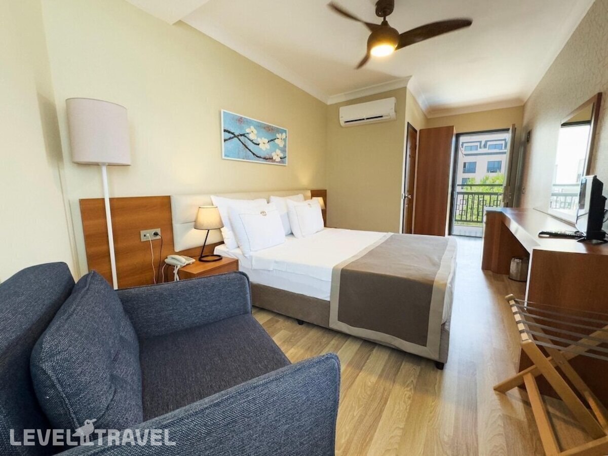 фотографии номера Стандартный с частичным видом на море отеля Uras Beach Hotel в Турция(Фетхие) - фото №1
