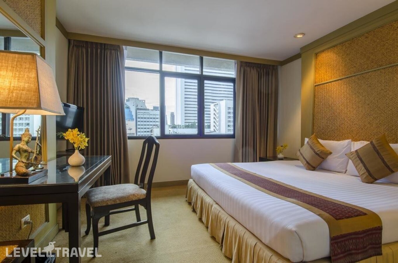 фотографии номера Люкс с видом на город отеля The Tarntawan Hotel Surawong Bangkok в Таиланд(Бангкок) - фото №13