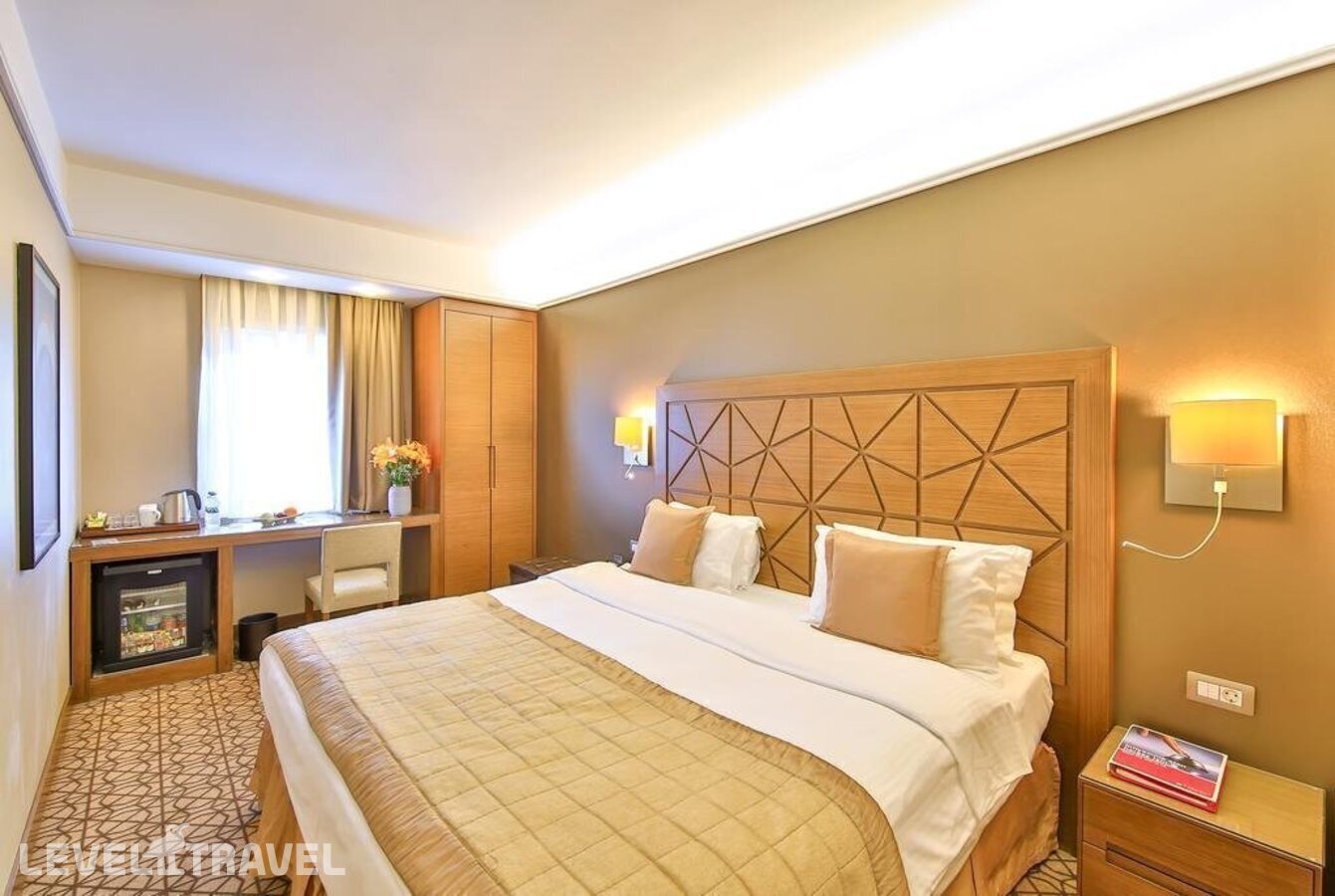 фотографии номера Одноместный номер отеля Ramada By Wyndham Istanbul Taksim (Ex. Madison Hotel) в Турция(Бейоглу) - фото №1