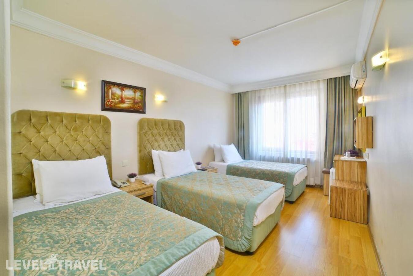 фотографии номера Трехместный номер отеля Grand Ant Hotel в Турция(Фатих) - фото №13