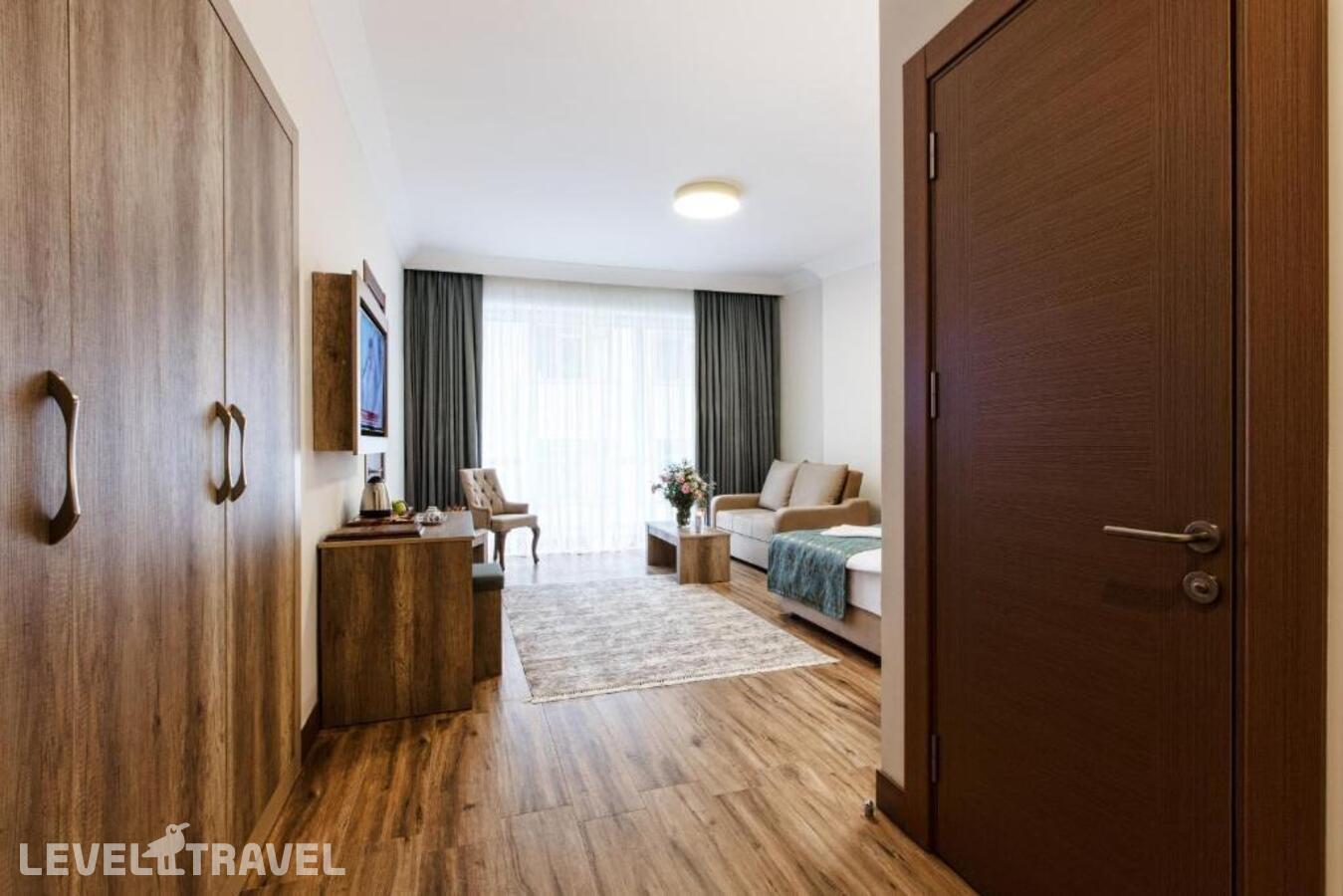 фотографии номера Трехместный делюкс отеля Mari Suites Hotel в Турция(Кягытхане) - фото №4