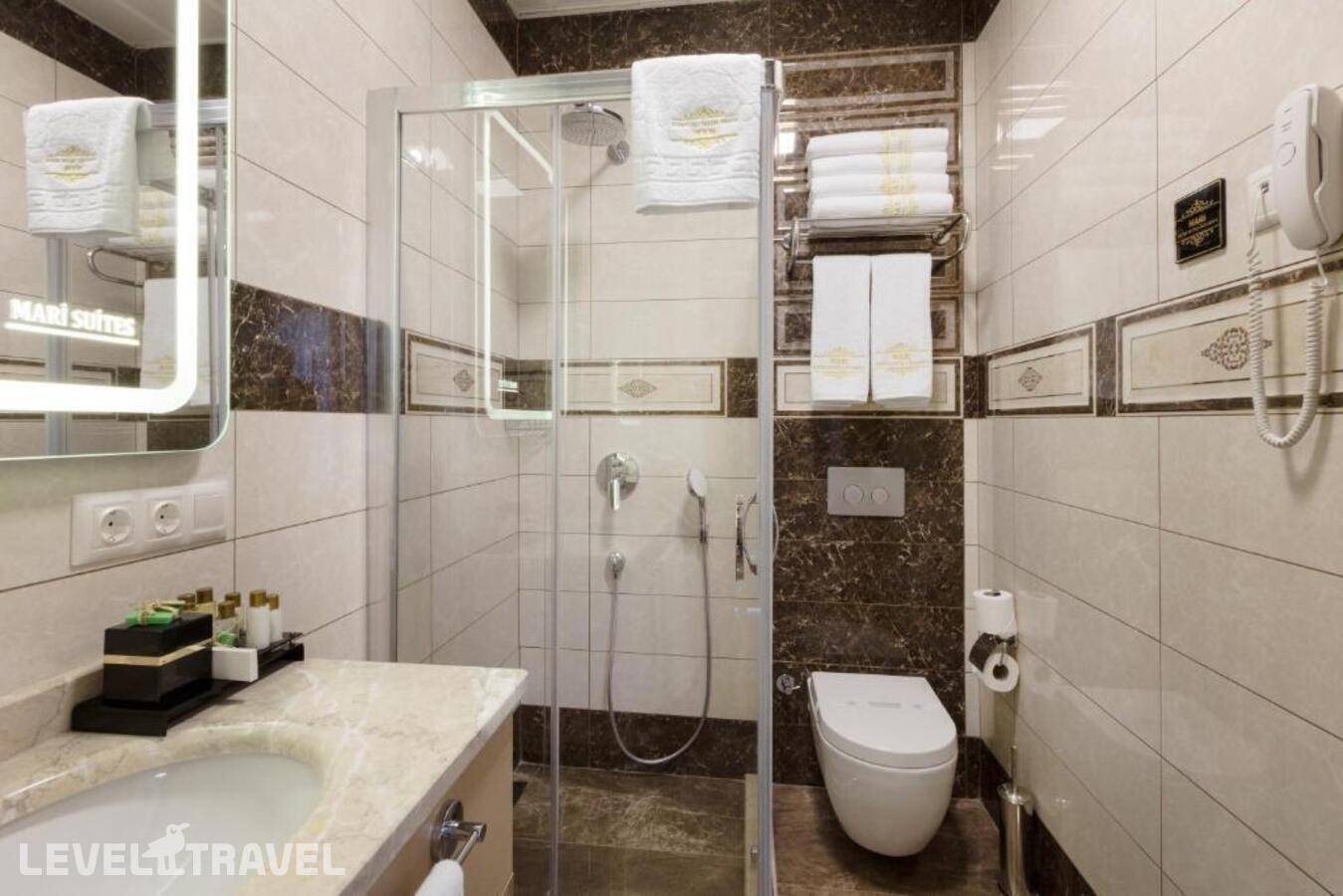 фотографии номера Трехместный делюкс отеля Mari Suites Hotel в Турция(Кягытхане) - фото №2