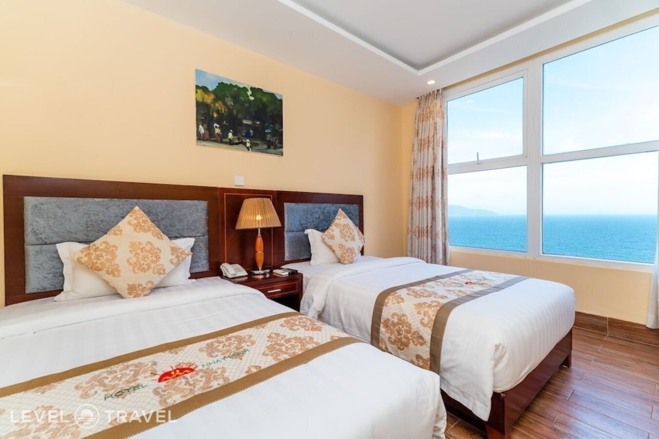 фотографии номера Делюкс с видом на море отеля Nhat Minh Hotel and Apartment в Вьетнам(Дананг) - фото №3