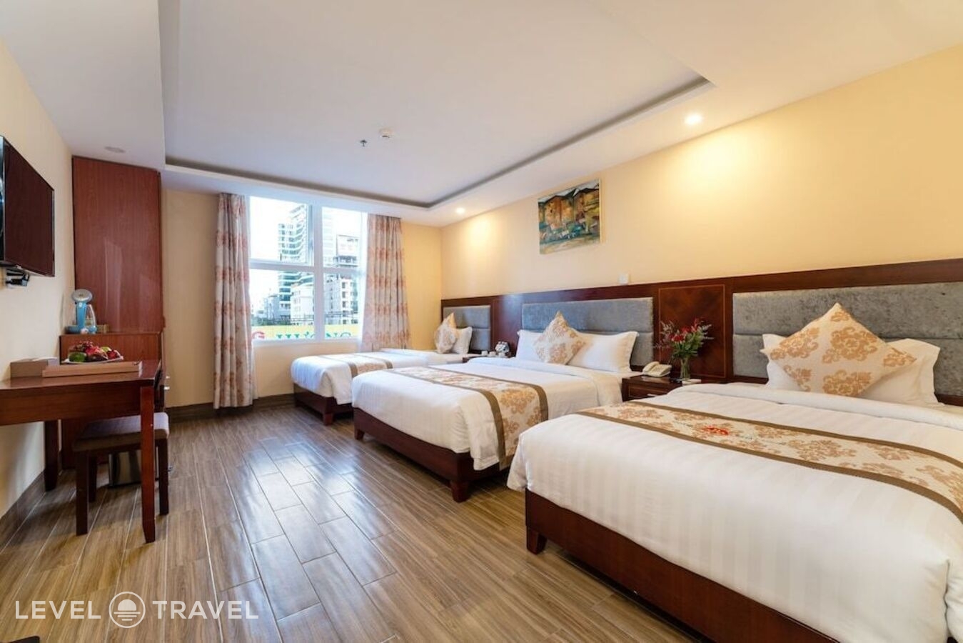 фотографии номера Трехместный делюкс с видом на город отеля Nhat Minh Hotel and Apartment в Вьетнам(Дананг) - фото №1