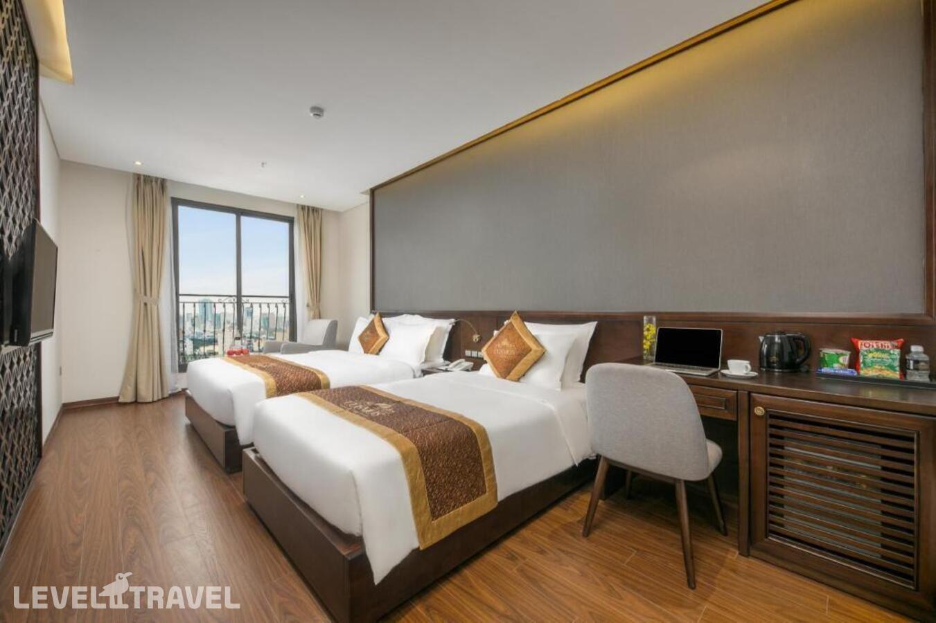 фотографии номера Трехместный делюкс отеля Cosmos Hotel Danang в Вьетнам(Дананг) - фото №1
